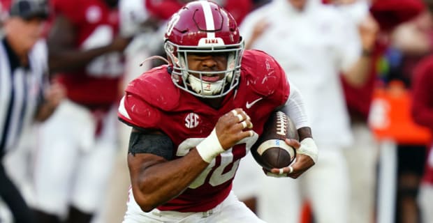 Alabama Crimson Tide linebacker Jihaad Campbell returns a fumble during a college football game in the SEC.